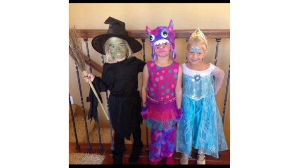 The triplets dressed up for Halloween, where they decided to be a witch, a monster and Elsa. (photo used with permission by Lily Statema)