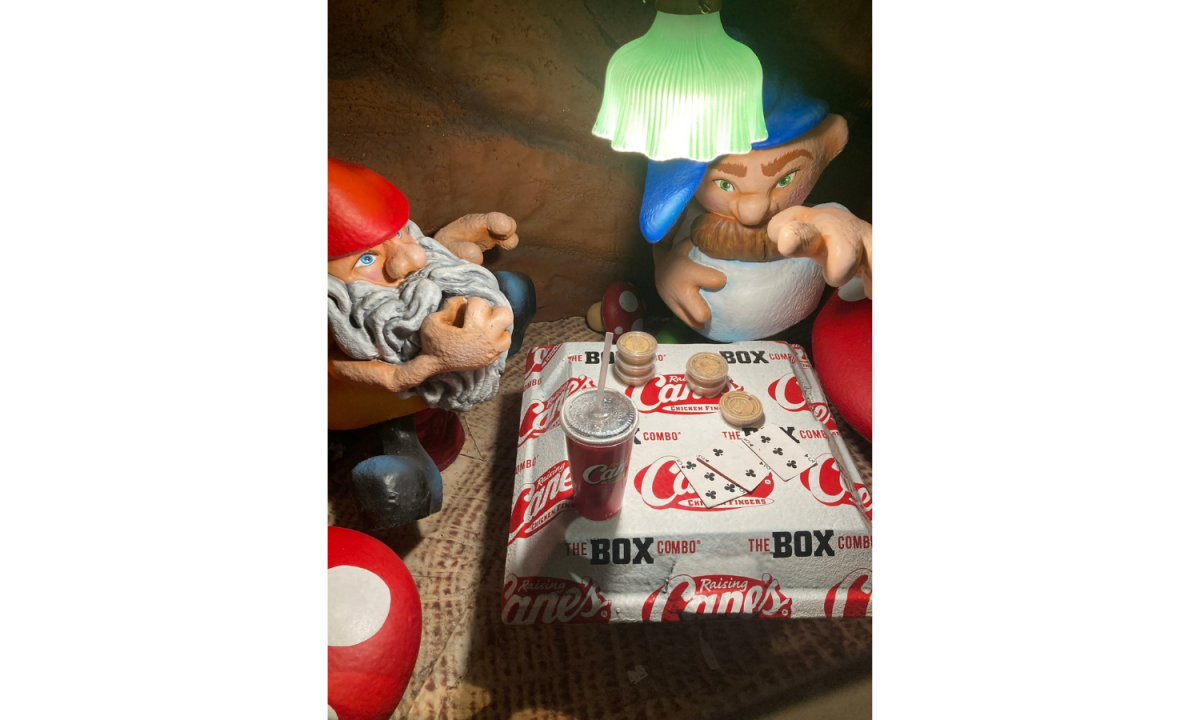 Two gnomes sharing Cane’s and playing cards inside a cave. This is at a Raising Cane’s restaurant on the Las Vegas Strip. Photo taken by Hannah Hilgenberg.