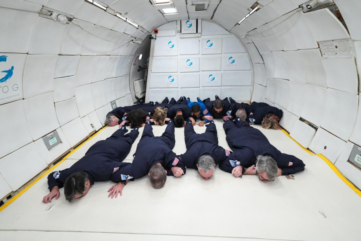 The passengers lay flat on their stomachs, in preparation for the zero-G cycle that is about to start (Photo used with permission by Derek Dillman).
